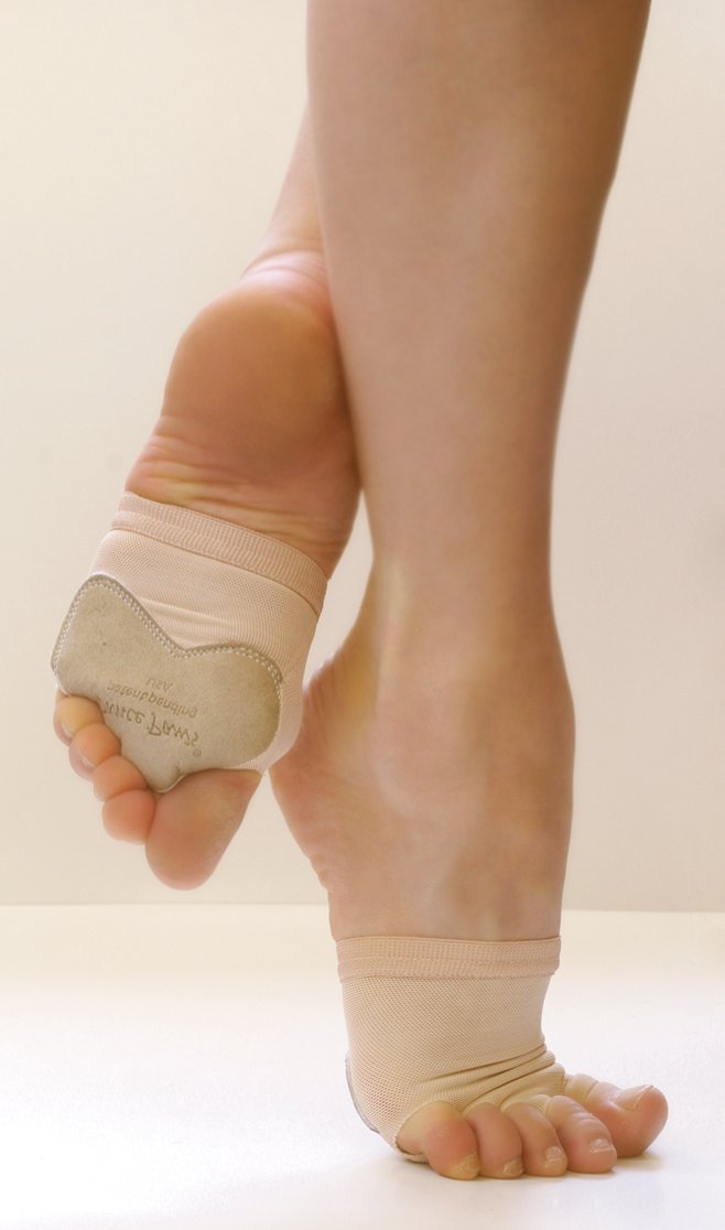 En pointe dancer wearing Dance Paws